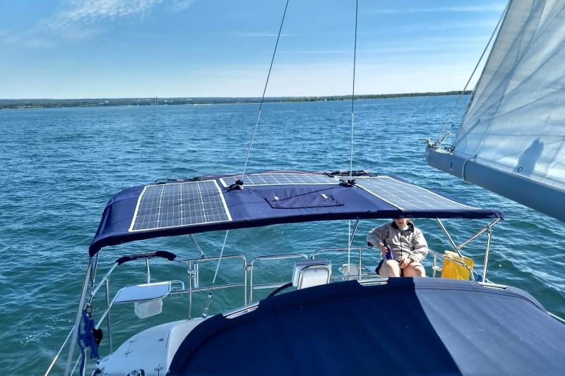flexible solar panel installed on an RV roof and marine for off-grid power.