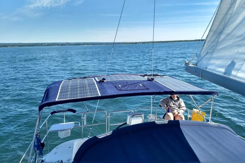 Sola-E anti-micro-crack flexible solar panel installed on an RV roof and marine for off-grid power.