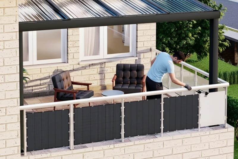 Lightweight Sola-E solar panels easily mounted on an apartment balcony railing for residential energy.