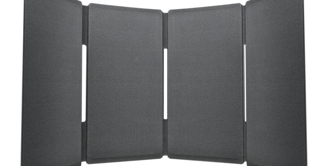 Foldable solar panel in semi-folded state showing hinge construction and flexible fabric connections under tension.