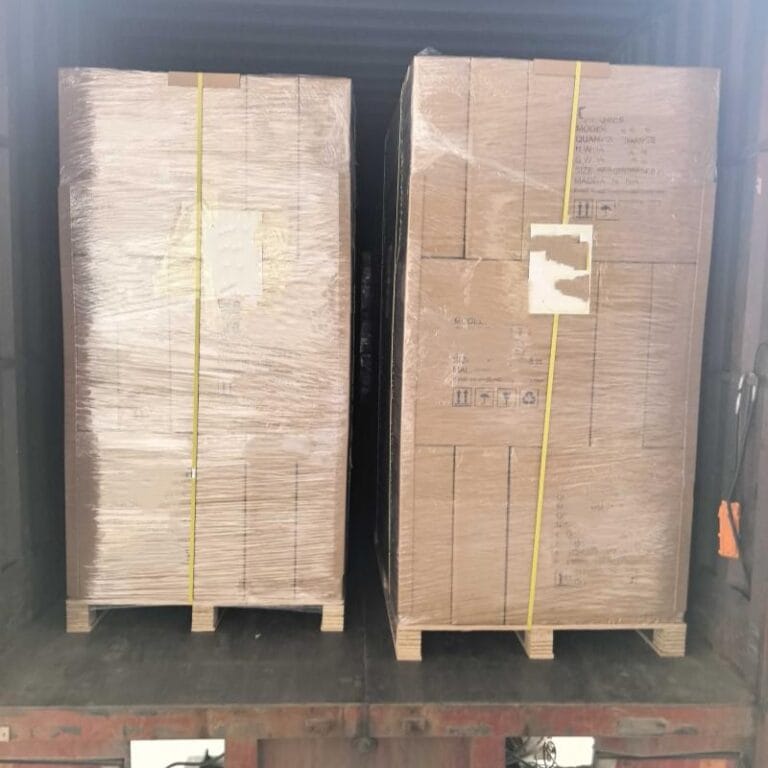 Container loading process of sola-e portable solar panels for international bulk delivery.