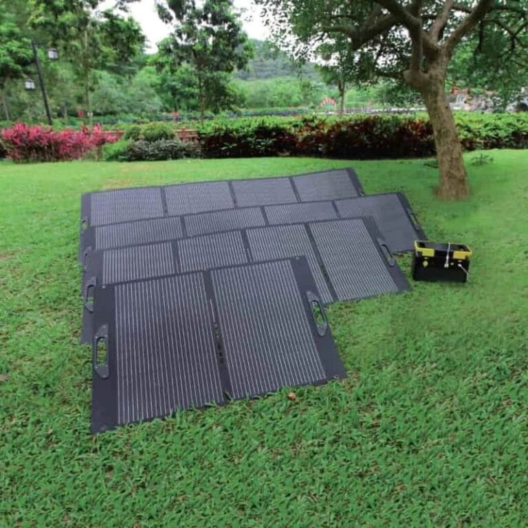 Wholesale 15w 100w 200w 400w foldable solar panel spread out on grass for camping power generation, customized ETFE Portable Solar Panel Factory