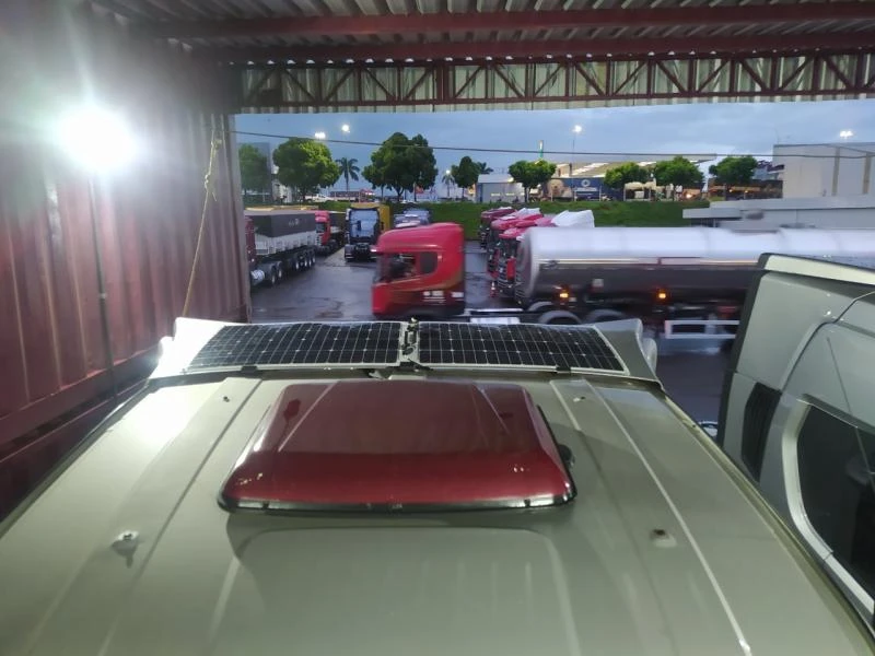Installed dual 200W 36V rectangular solar panels on Brazilian commercial truck cab roof — vibration-resistant layout validated in real-world fleet conditions.